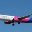 Economy air travel. Wizz Air Airbus A321 passenger jet plane on approach displaying the airline’s revised livery