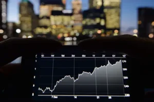 London’s FTSE 100 hovers close to all-time high on mining rally