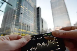 Miners lift UK’s FTSE 100 higher as inflation eases further