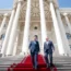 Foreign Secretary Lord David Cameron leaves the Presidential Palace in Dushanbe with Tajik foreign minister Sirojiddin Muhriddin