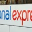 A National Express coach leaves the Victoria Coach Station in central London