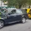 An AA patrol works on a car