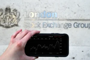 Global stock market rally continues as FTSE 100 races to another record high