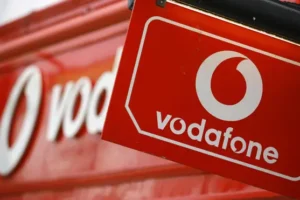 Vodafone returns to growth after cost cuts, as Three merger talks continue