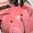 A piggy bank being smashed
