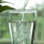 Pouring water into a glass