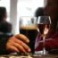 People with drinks in a pub