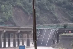 At least 12 people dead and more than 30 missing after China bridge collapses due to flooding