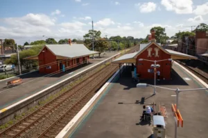 Father and toddler killed after pram carrying twins hit by train after falling onto tracks