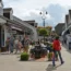 People walking in Bicester Village outlet shopping centre
