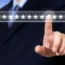 Businessman hand touching password login device screen, cyber security concept