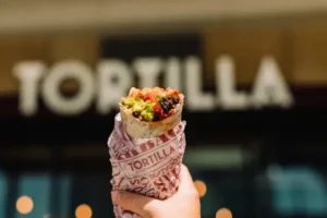 Tortilla Mexican Grill shares tumble on sales hit from move to quit Deliveroo