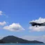 Airliner or Passenger plane Indigo Airbus A320 neo landing to airport next to the beach. airplane flies extremely low over the sea beach.