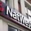 A sign outside a branch of NatWest