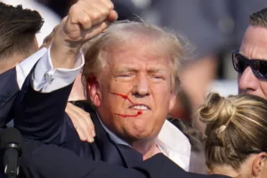 Trump struck by bullet during assassination attempt, FBI says
