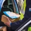 An Evri courier taking parcels out of a car
