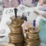 Models of people on top of coins and banknotes