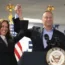 US vice president Kamala Harris, left, and second gentleman Doug Emhoff address staff at her campaign headquarters