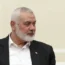 Ismail Haniyeh faces left at a meeting with the Iranian President