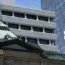 A Japanese flag flutters at the Bank of Japan headquarters in Tokyo,