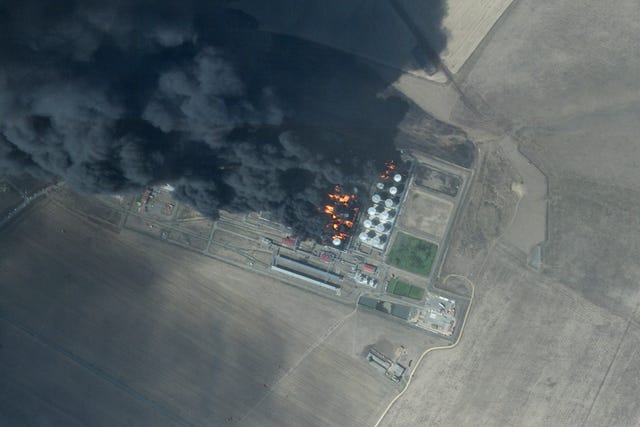 14b7d6d4648d4e94a61569a9069fa94b-1 This satellite photo from Planet Labs PBC shows a fire at an oil depot earlier hit by a drone attack near Proletarsk, Russia, on Monday