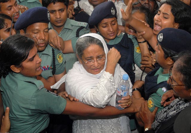 33d4120d982d4ba7afe0b30a52206e01 Police escort former Bangladeshi prime minister Sheikh Hasina (Abu Taher Khokon/AP)
