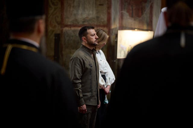 3c426a077da2415badafe00bb3eb7d03 Ukrainian President Volodymyr Zelensky and his wife Olena attend a service in Saint Sophia Cathedral during celebration of the Ukrainian Independence Day in Kyiv