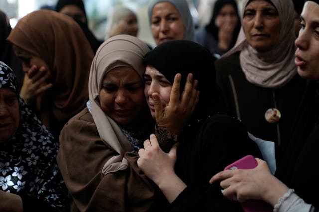 504c7b1414394364aad6d543a5c0551f Mourners cry during the funeral of five Palestinians who were killed by an Israeli military air strike in the northern occupied West Bank