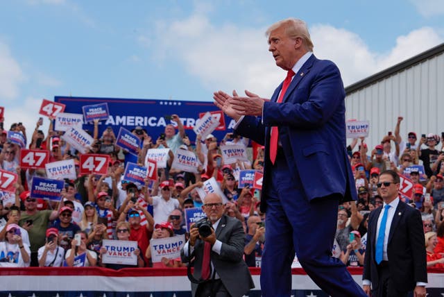 5fc858f9e2014f2dbe228d21f1724c17 Donald Trump arrives at the campaign rally in North Carolina