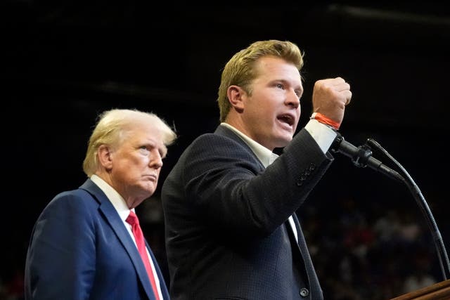6362451c760c4eec976a470c0a07f1cc Republican presidential nominee former President Donald Trump listens as Montana Senate candidate Tim Sheehy speaks at a campaign rally