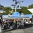 Visitors to Nagasaki Peace Park crouch down as an earthquake alert is issued in western Japan