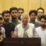 Muhammad Yunus speaks to the media after his arrival (Ahadul Karim Khan/AP)