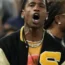 Travis Scott watches the Serbia vs United States game (Mark J Terrill/AP)