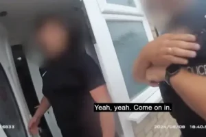 ‘I’ve been expecting you’ Watch moment rioter who had been waiting for police is arrested on doorstep