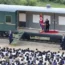 North Korean leader Kim Jong Un delivers a speech as he visits a flood-hit area in Uiju