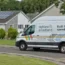 Highland Broadband parked on a street with houses in the background