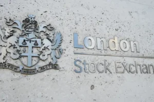FTSE 100 slips amid strength in sterling after strong UK retail sales