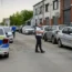 A police officer stands outside the residence of internet influencer Andrew Tate during an early morning police search raid on the outskirts of Bucharest, Romania