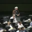 Iranian legislators attend an open session of parliament