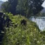 In this photograph made available by the Serbian Ministry of Interior, Serbian Police officers search a bank of the Drina River near the town of Ljubovija, Serbia