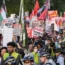 Protesters march during a demonstration near the Democratic National Convention