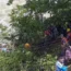 Rescuers above a a river near Abukhaireni town