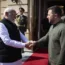 Narendra Modi shakes hands with Volodymyr Zelensky