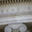 The US Treasury Department building at dusk in Washington