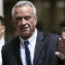 Independent presidential candidate Robert F Kennedy Jr waves to the media outside the Nassau County Supreme Court in Mineola, New York