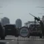 Ukrainian soldiers on guard with a machine gun in Kyiv