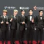 South Korean singer Taeil, right, poses with other members of K-Pop group NCT 127