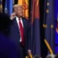Republican presidential nominee former President Donald Trump puts his hand to his ear after speaking at the National Guard Association of the United States’ 146th General Conference in Detroit