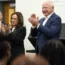 Kamala Harris and Tim Walz at a school