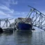 The fallen Francis Scott Key Bridge in Baltimore is pictured in March, as divers assisted crews with the complicated and meticulous operation of removing steel and concrete